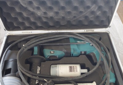 Location Perceuse à percussion électrique Makita à Bourgbarré